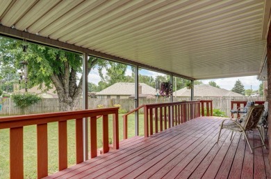 This one's been loved and it shows. Solid all brick home with on Horton Smith Golf Course in Missouri - for sale on GolfHomes.com, golf home, golf lot
