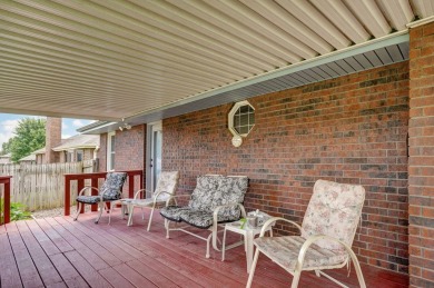 This one's been loved and it shows. Solid all brick home with on Horton Smith Golf Course in Missouri - for sale on GolfHomes.com, golf home, golf lot