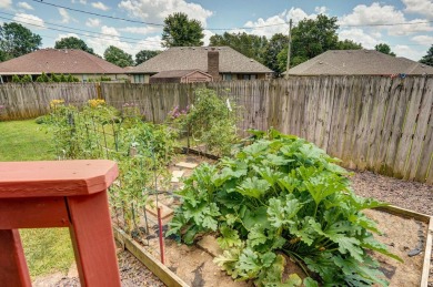 This one's been loved and it shows. Solid all brick home with on Horton Smith Golf Course in Missouri - for sale on GolfHomes.com, golf home, golf lot