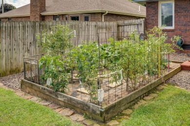This one's been loved and it shows. Solid all brick home with on Horton Smith Golf Course in Missouri - for sale on GolfHomes.com, golf home, golf lot