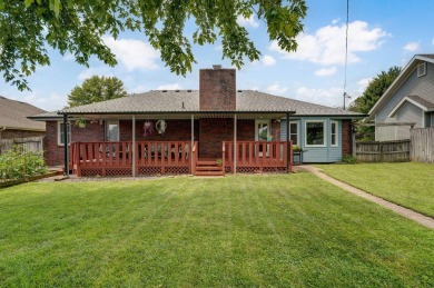 This one's been loved and it shows. Solid all brick home with on Horton Smith Golf Course in Missouri - for sale on GolfHomes.com, golf home, golf lot