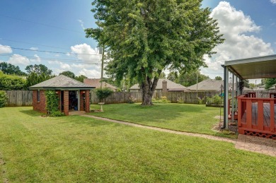 This one's been loved and it shows. Solid all brick home with on Horton Smith Golf Course in Missouri - for sale on GolfHomes.com, golf home, golf lot