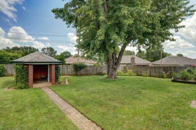 This one's been loved and it shows. Solid all brick home with on Horton Smith Golf Course in Missouri - for sale on GolfHomes.com, golf home, golf lot