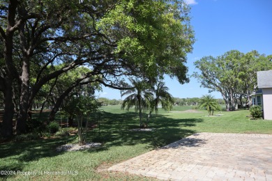 Spectacular view overlooking the GOLF COURSE, located between on Timber Pines Golf Course in Florida - for sale on GolfHomes.com, golf home, golf lot