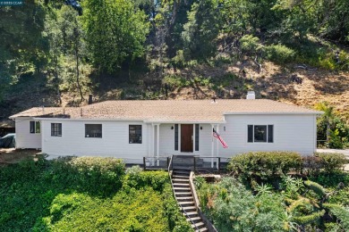 Perched on a private ridge above Orinda, this light-bathed on Orinda Country Club in California - for sale on GolfHomes.com, golf home, golf lot