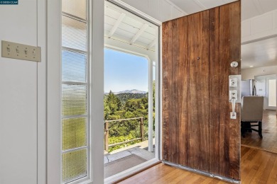Perched on a private ridge above Orinda, this light-bathed on Orinda Country Club in California - for sale on GolfHomes.com, golf home, golf lot