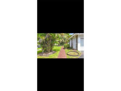 Welcome to this charming 6 bedroom 3 bathroom home located in on The Club at Emerald Hills in Florida - for sale on GolfHomes.com, golf home, golf lot