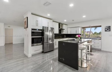 Welcome to this charming 6 bedroom 3 bathroom home located in on The Club at Emerald Hills in Florida - for sale on GolfHomes.com, golf home, golf lot