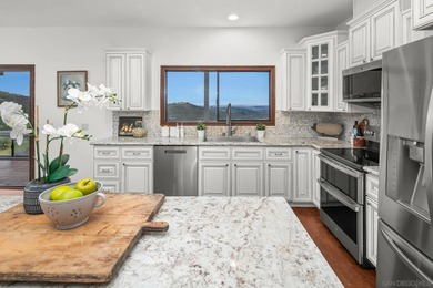 Welcome home to this stunning West-facing estate with panoramic on The Havens Country Club in California - for sale on GolfHomes.com, golf home, golf lot