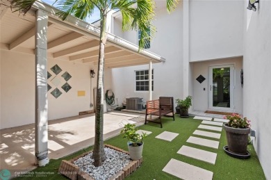 Completely remodeled in 2023, this 2-bedroom, 2.5-bath lakefront on Palm-Aire Country Club and Resort - Palms in Florida - for sale on GolfHomes.com, golf home, golf lot