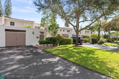Completely remodeled in 2023, this 2-bedroom, 2.5-bath lakefront on Palm-Aire Country Club and Resort - Palms in Florida - for sale on GolfHomes.com, golf home, golf lot