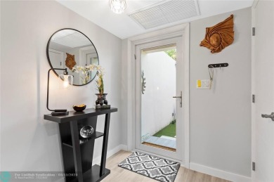 Completely remodeled in 2023, this 2-bedroom, 2.5-bath lakefront on Palm-Aire Country Club and Resort - Palms in Florida - for sale on GolfHomes.com, golf home, golf lot