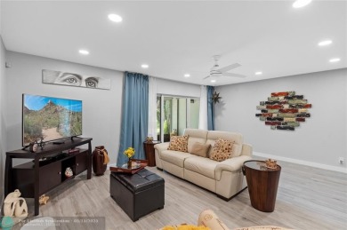 Completely remodeled in 2023, this 2-bedroom, 2.5-bath lakefront on Palm-Aire Country Club and Resort - Palms in Florida - for sale on GolfHomes.com, golf home, golf lot