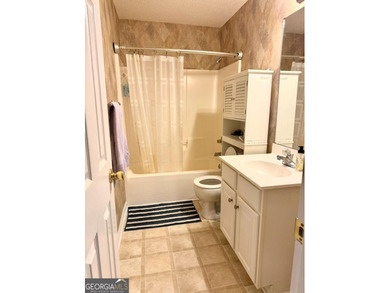 Welcome to this private home tucked in the River North Golf on Canongate At Healy Point Country Club in Georgia - for sale on GolfHomes.com, golf home, golf lot