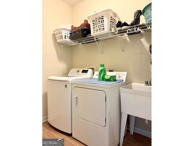 Welcome to this private home tucked in the River North Golf on Canongate At Healy Point Country Club in Georgia - for sale on GolfHomes.com, golf home, golf lot