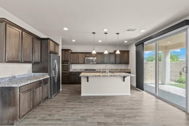 Welcome home to this breath taking gem in the highly on Rhodes Ranch Golf Club in Nevada - for sale on GolfHomes.com, golf home, golf lot