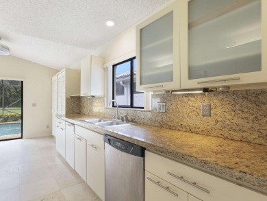 Enjoy the Boca Woods lifestyle in this beautiful Pinewood model on Boca Woods Country Club in Florida - for sale on GolfHomes.com, golf home, golf lot