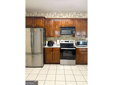 Welcome to this private home tucked in the River North Golf on Canongate At Healy Point Country Club in Georgia - for sale on GolfHomes.com, golf home, golf lot