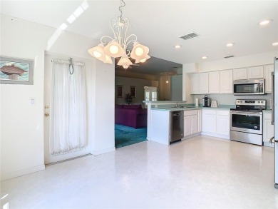 Under contract-accepting backup offers. Live in the Tampa Bay on Tampa Bay Golf and Country Club in Florida - for sale on GolfHomes.com, golf home, golf lot