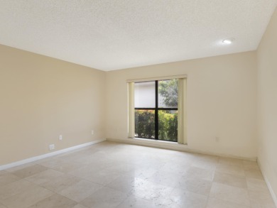 Enjoy the Boca Woods lifestyle in this beautiful Pinewood model on Boca Woods Country Club in Florida - for sale on GolfHomes.com, golf home, golf lot