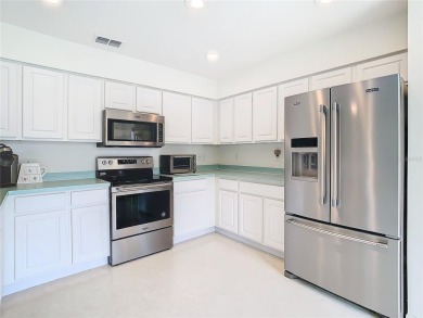 Under contract-accepting backup offers. Live in the Tampa Bay on Tampa Bay Golf and Country Club in Florida - for sale on GolfHomes.com, golf home, golf lot
