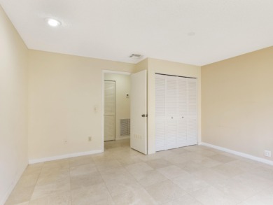Enjoy the Boca Woods lifestyle in this beautiful Pinewood model on Boca Woods Country Club in Florida - for sale on GolfHomes.com, golf home, golf lot