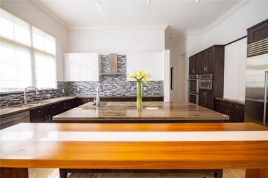 FURNISHED This is an amazing home located on one of the most on Parkland Golf Club in Florida - for sale on GolfHomes.com, golf home, golf lot