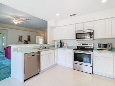 Under contract-accepting backup offers. Live in the Tampa Bay on Tampa Bay Golf and Country Club in Florida - for sale on GolfHomes.com, golf home, golf lot