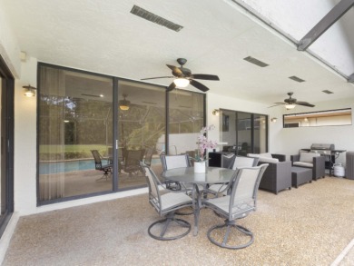 Enjoy the Boca Woods lifestyle in this beautiful Pinewood model on Boca Woods Country Club in Florida - for sale on GolfHomes.com, golf home, golf lot