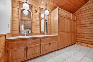 Welcome to an One-of-a-Kind Dovetail Log Home in Buckhorn on White Path Golf Club in Georgia - for sale on GolfHomes.com, golf home, golf lot