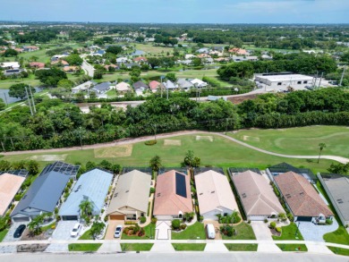 Enjoy the Boca Woods lifestyle in this beautiful Pinewood model on Boca Woods Country Club in Florida - for sale on GolfHomes.com, golf home, golf lot