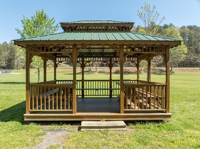 Welcome to an One-of-a-Kind Dovetail Log Home in Buckhorn on White Path Golf Club in Georgia - for sale on GolfHomes.com, golf home, golf lot