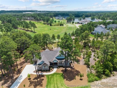 Welcome to your dream home in the coveted gated community of Mid on Mid South Club in North Carolina - for sale on GolfHomes.com, golf home, golf lot