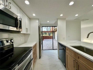 Newly renovated and move-in ready. This spacious 2-bedroom, 2 on Pine Island Ridge Country Club in Florida - for sale on GolfHomes.com, golf home, golf lot