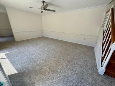 Move-in ready in the heart of Davie close to highways on Pine Island Ridge Country Club in Florida - for sale on GolfHomes.com, golf home, golf lot