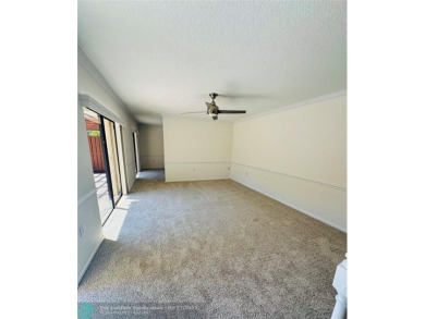 Move-in ready in the heart of Davie close to highways on Pine Island Ridge Country Club in Florida - for sale on GolfHomes.com, golf home, golf lot