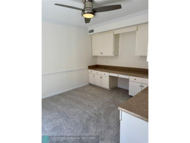Move-in ready in the heart of Davie close to highways on Pine Island Ridge Country Club in Florida - for sale on GolfHomes.com, golf home, golf lot