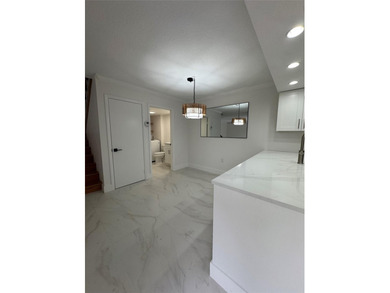 Newly renovated and move-in ready. This spacious 2-bedroom, 2 on Pine Island Ridge Country Club in Florida - for sale on GolfHomes.com, golf home, golf lot