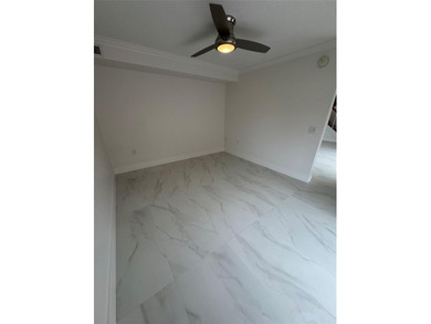 Newly renovated and move-in ready. This spacious 2-bedroom, 2 on Pine Island Ridge Country Club in Florida - for sale on GolfHomes.com, golf home, golf lot