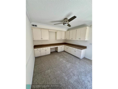 Move-in ready in the heart of Davie close to highways on Pine Island Ridge Country Club in Florida - for sale on GolfHomes.com, golf home, golf lot