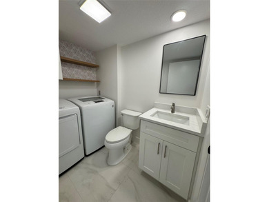 Newly renovated and move-in ready. This spacious 2-bedroom, 2 on Pine Island Ridge Country Club in Florida - for sale on GolfHomes.com, golf home, golf lot