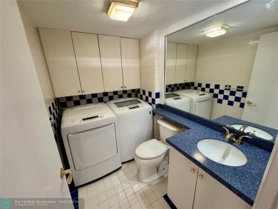 Move-in ready in the heart of Davie close to highways on Pine Island Ridge Country Club in Florida - for sale on GolfHomes.com, golf home, golf lot