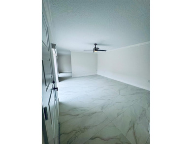 Newly renovated and move-in ready. This spacious 2-bedroom, 2 on Pine Island Ridge Country Club in Florida - for sale on GolfHomes.com, golf home, golf lot