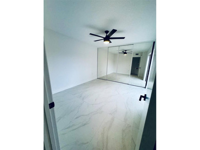 Newly renovated and move-in ready. This spacious 2-bedroom, 2 on Pine Island Ridge Country Club in Florida - for sale on GolfHomes.com, golf home, golf lot