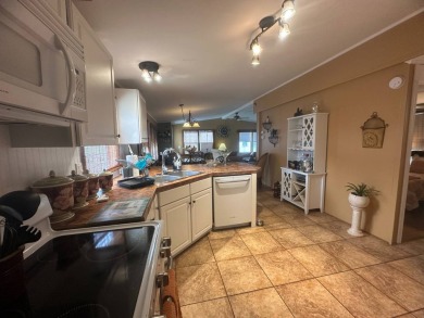 Ready to embrace the Florida lifestyle? This beautifully on Del Tura Golf and Country Club in Florida - for sale on GolfHomes.com, golf home, golf lot