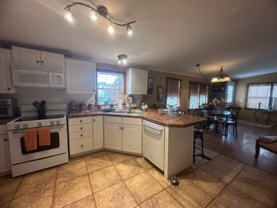 Ready to embrace the Florida lifestyle? This beautifully on Del Tura Golf and Country Club in Florida - for sale on GolfHomes.com, golf home, golf lot