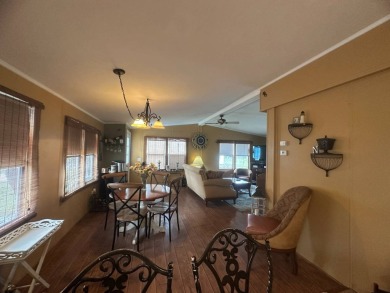 Ready to embrace the Florida lifestyle? This beautifully on Del Tura Golf and Country Club in Florida - for sale on GolfHomes.com, golf home, golf lot