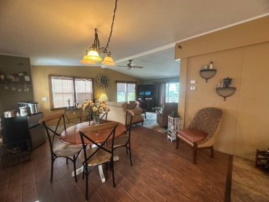 Ready to embrace the Florida lifestyle? This beautifully on Del Tura Golf and Country Club in Florida - for sale on GolfHomes.com, golf home, golf lot
