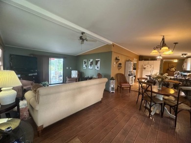 Ready to embrace the Florida lifestyle? This beautifully on Del Tura Golf and Country Club in Florida - for sale on GolfHomes.com, golf home, golf lot