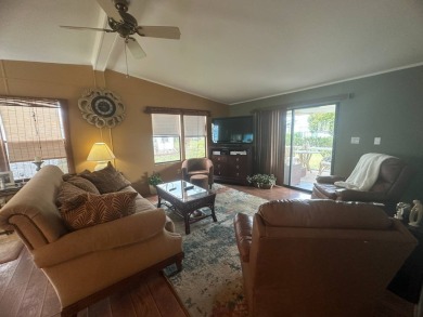 Ready to embrace the Florida lifestyle? This beautifully on Del Tura Golf and Country Club in Florida - for sale on GolfHomes.com, golf home, golf lot